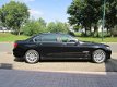 BMW 7-serie - 740Li lang/zwart leder/navi/schuifd/boekjes/N.A.P - 1 - Thumbnail