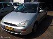 Ford Focus Wagon - 1.4-16V Ambiente - 1 - Thumbnail