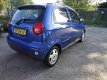 Chevrolet Matiz - 0.8 STYLE / AIRCO / ELEK RMN / C.VERGR.AFSTANDBEDIEND / LM VELGEN / RADIO-CD MP3 / - 1 - Thumbnail