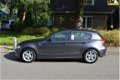 BMW 1-serie - 120i Business Line leer/cruise/NAP/dealer onder - 1 - Thumbnail