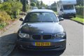 BMW 1-serie - 120i Business Line leer/cruise/NAP/dealer onder - 1 - Thumbnail