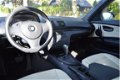 BMW 1-serie - 120i Business Line leer/cruise/NAP/dealer onder - 1 - Thumbnail