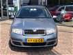 Skoda Fabia Combi - 1.4-16V Ambiente Airco, LM wielen - 1 - Thumbnail