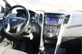 Hyundai i30 - 1.6 GDi i-Motion Plus | Lm velgen | Cruise control | Bluetooth | Airco | - 1 - Thumbnail