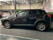 Mazda CX-3 - 2.0 SkyActiv-G 120 Dynamic NAVI LEER XENON - 1 - Thumbnail