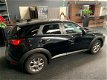 Mazda CX-3 - 2.0 SkyActiv-G 120 Dynamic NAVI LEER XENON - 1 - Thumbnail