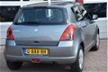 Suzuki Swift - 1.3 Comfort - 1 - Thumbnail