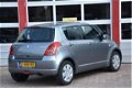 Suzuki Swift - 1.3 Comfort - 1 - Thumbnail