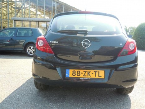 Opel Corsa - 1.2-16V Enjoy - 1