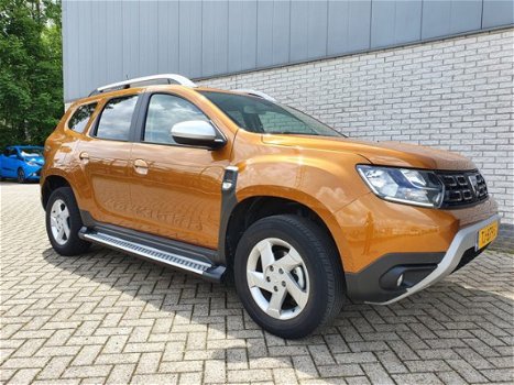 Dacia Duster - TCe 125 Comfort | inclusief gratis rijklaarpakket twv € 695, - (foto 2) | Hoge instap - 1