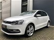 Volkswagen Polo - 1.2 TSI BlueMotion Comfortline 17 Inch/Airco/AUX/Facelift/PDC/Cruise Control/Elekt - 1 - Thumbnail