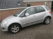 Suzuki SX4 - 1.6 Exclusive, goed werkende airco tel 06-25113430 - 1 - Thumbnail