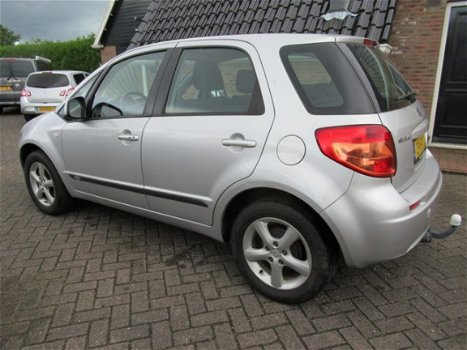 Suzuki SX4 - 1.6 Exclusive, goed werkende airco tel 06-25113430 - 1