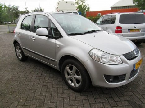 Suzuki SX4 - 1.6 Exclusive, goed werkende airco tel 06-25113430 - 1