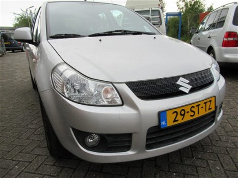 Suzuki SX4 - 1.6 Exclusive, goed werkende airco tel 06-25113430 - 1