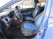 Hyundai i10 - 1.0i 66pk Blue 4pl. Comfort Climate en LM velgen - 1 - Thumbnail