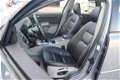 Volvo V50 - T5 AWD Aut. Summum, Family Line, Schuifdak, Navi, Xenon, Leder - 1 - Thumbnail