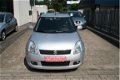 Suzuki Swift - 1.5 Exclusive airco, 5 deurs - 1 - Thumbnail