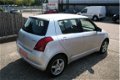 Suzuki Swift - 1.5 Exclusive airco, 5 deurs - 1 - Thumbnail