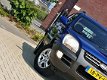 Kia Sportage - 2.0 CVVT Comfort / Airco / Hooge instap / 1e Eigenaar - 1 - Thumbnail