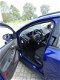 Ford Focus Wagon - 1.0 Ecoboost 125pk Edition NAVI/CRUISE/PDC/BT-TEL/LMV - 1 - Thumbnail