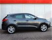 Hyundai ix35 - 2.0i 4WD i-Catcher (panodak, xenon, navi, camera) - 1 - Thumbnail