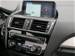 BMW 1-serie - 116d 116pk Centennial High Executive AUTOMAAT VAN: € 18.650, - VOOR: € 17.950, - 1 - Thumbnail