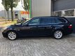 BMW 5-serie Touring - 520i Corporate Lease Business Line Edition I Navigatie/Leder/TH/LMV - 1 - Thumbnail