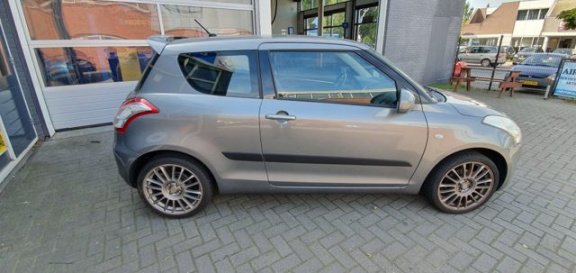 Suzuki Swift - SPORT 1.2 16V LEER INTERIEUR NAVIGATIE - 1