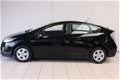 Toyota Prius - 1.8 Comfort | Navigatie | Climate control | Cruise control | Mistlampen | Lm velgen | - 1 - Thumbnail