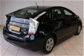 Toyota Prius - 1.8 Comfort | Navigatie | Climate control | Cruise control | Mistlampen | Lm velgen | - 1 - Thumbnail
