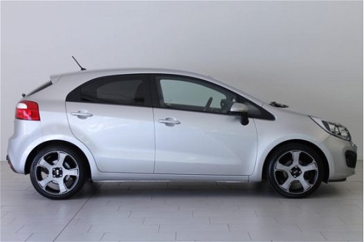 Kia Rio - 1.2 CVVT Plus Pack | RADIO-NAVIGATIE | AIRCO | CRUISE-CONTROL | 17 INCH | TREKHAAK | DONKE - 1