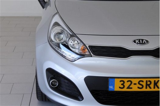 Kia Rio - 1.2 CVVT Plus Pack | RADIO-NAVIGATIE | AIRCO | CRUISE-CONTROL | 17 INCH | TREKHAAK | DONKE - 1