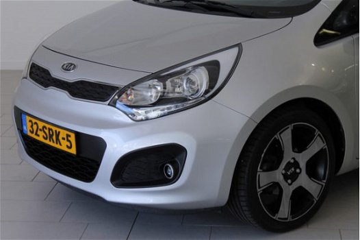 Kia Rio - 1.2 CVVT Plus Pack | RADIO-NAVIGATIE | AIRCO | CRUISE-CONTROL | 17 INCH | TREKHAAK | DONKE - 1