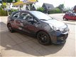 Kia Rio - 1.2 CVVT COMFORTLINE AIRCO/CRUISE - 1 - Thumbnail