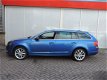 Skoda Octavia Combi - 1.2 TSI DSG/Aut7 Elegance BSN (leer, navi, pdc) - 1 - Thumbnail