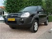 Hyundai Tucson - 2.0i Dynamic *156.000 org.km.*DEALER ONDERHOUDEN - 1 - Thumbnail