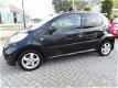 Peugeot 107 - 1.0-12V 5drs Black & Silver Airco, Half-leer, NAP, Lm velgen NL AUTO - 1 - Thumbnail