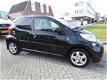 Peugeot 107 - 1.0-12V 5drs Black & Silver Airco, Half-leer, NAP, Lm velgen NL AUTO - 1 - Thumbnail