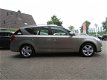 Kia Cee'd - 1.4 CVVT Navigator Plus Pack | CLIMA AIRCO | NAVIGATIE + BLUETOOTH | TREKHAAK | PDC | BO - 1 - Thumbnail