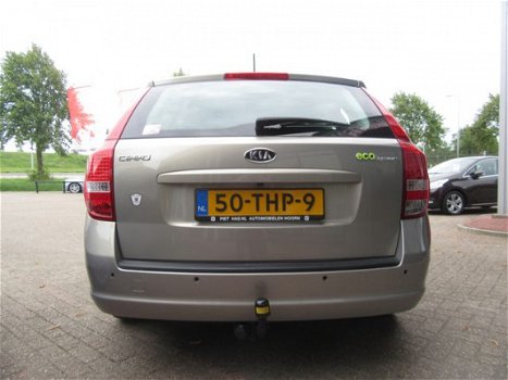 Kia Cee'd - 1.4 CVVT Navigator Plus Pack | CLIMA AIRCO | NAVIGATIE + BLUETOOTH | TREKHAAK | PDC | BO - 1