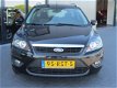 Ford Focus Wagon - 1.6 Comfort Airco, Trekhaak, NAVI, voorruit verwarming - 1 - Thumbnail