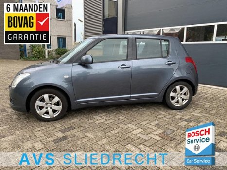 Suzuki Swift - 1.3 Shogun / Airco / Trekhaak / LMV 15inch / 5 deurs / Elek. ramen - 1