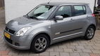 Suzuki Swift - 1.5 5drs exclusive uniek 64000km airco keyles start - 1 - Thumbnail