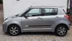 Suzuki Swift - 1.5 5drs exclusive uniek 64000km airco keyles start - 1 - Thumbnail