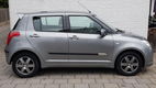 Suzuki Swift - 1.5 5drs exclusive uniek 64000km airco keyles start - 1 - Thumbnail