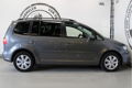 Volkswagen Touran - 1.6 TDI Comfortline BlueMotion 7p. XENON NAVIGATIE 7-PERSOON - 1 - Thumbnail