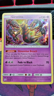 Giratina  86/236  Holo SM Unified Minds