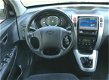Hyundai Tucson - 2.0i Style, trekhaak, cruise-control, automatische airco - 1 - Thumbnail