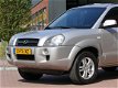 Hyundai Tucson - 2.0i Style, trekhaak, cruise-control, automatische airco - 1 - Thumbnail